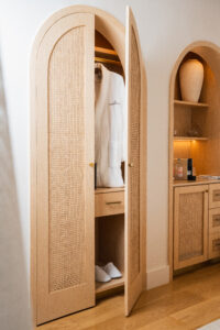 historic boutique hotel miami mediterranean design details Mediterranean Revival style interior design details with rattan wardrobes at Donatella Hotel