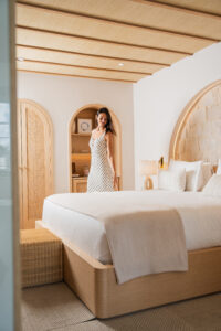 where to stay art deco weekend miami elegant room Guest enjoying the elegance and design of a boutique room at Donatella Hotel, the ideal choice for where to stay for Art Deco Weekend Miami